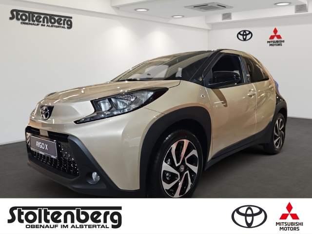 Foto 1 - Toyota Aygo X Teamplayer 1.0 ACC Apple CarPlay Android Auto DAB SHZ Spurhalteass., ginger beige / night sky blackmetallic / night sky