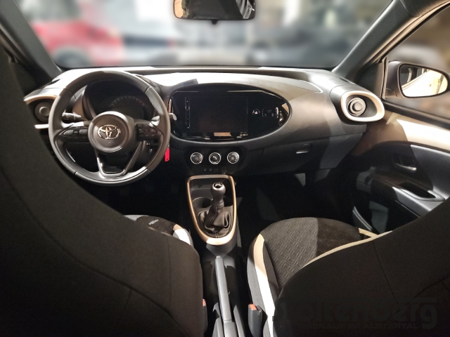 Foto 1 - Toyota Aygo X Teamplayer 1.0 ACC Apple CarPlay Android Auto DAB SHZ Spurhalteass., ginger beige / night sky blackmetallic / night sky