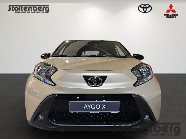 Foto 1 - Toyota Aygo X Teamplayer 1.0 ACC Apple CarPlay Android Auto DAB SHZ Spurhalteass., ginger beige / night sky blackmetallic / night sky