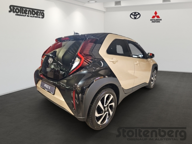 Foto 1 - Toyota Aygo X Teamplayer 1.0 ACC Apple CarPlay Android Auto DAB SHZ Spurhalteass., ginger beige / night sky blackmetallic / night sky