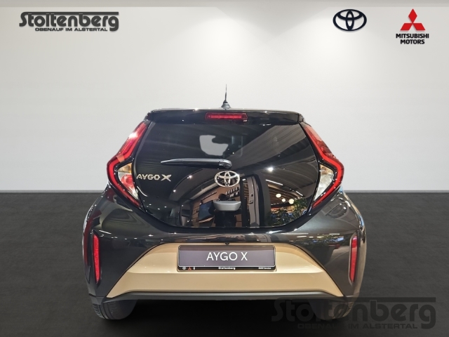 Foto 1 - Toyota Aygo X Teamplayer 1.0 ACC Apple CarPlay Android Auto DAB SHZ Spurhalteass., ginger beige / night sky blackmetallic / night sky