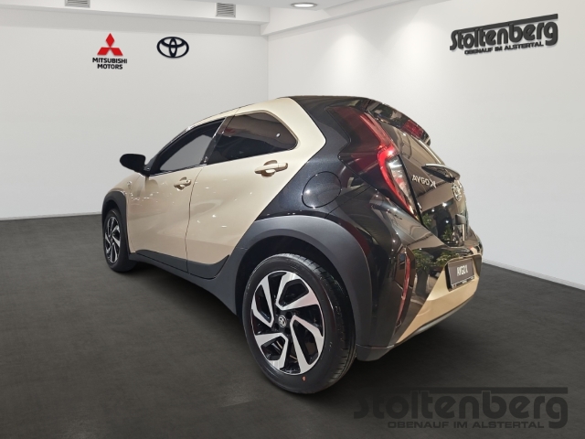 Foto 1 - Toyota Aygo X Teamplayer 1.0 ACC Apple CarPlay Android Auto DAB SHZ Spurhalteass., ginger beige / night sky blackmetallic / night sky