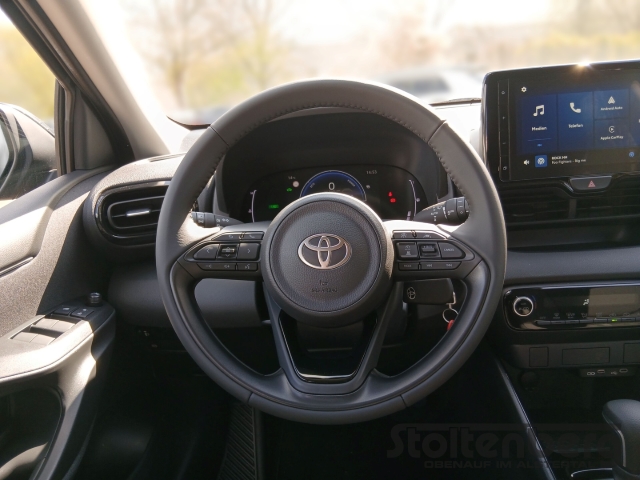 Foto 1 - Yaris 1.5 Dual-VVT-iE Hybrid Team D LED ACC Apple CarPlay Android Auto Musikstreaming, mysticschwarz mica