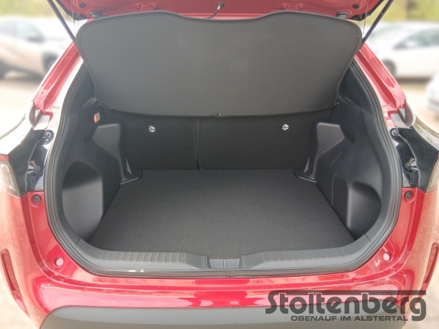 Foto 1 - Toyota Yaris Cross Teamplayer 1.5 Hybrid Navi LED Apple CarPlay Android Auto Klimaautom Musikstreaming, emotional red 2 (rot)