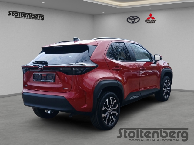 Foto 1 - Toyota Yaris Cross Teamplayer 1.5 Hybrid Navi LED Apple CarPlay Android Auto Klimaautom Musikstreaming, emotional red 2 (rot)