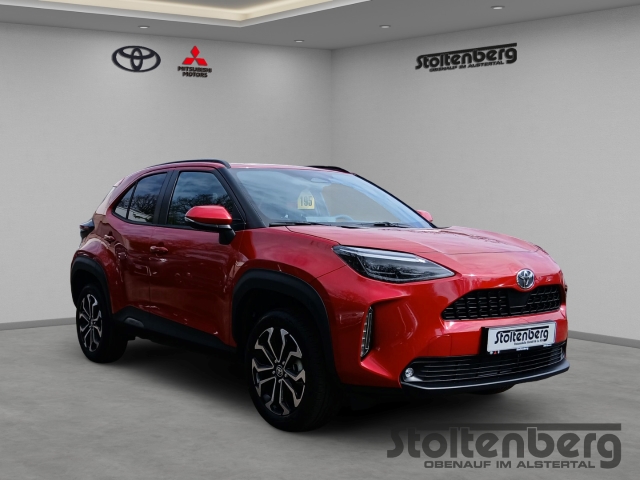 Foto 1 - Toyota Yaris Cross Teamplayer 1.5 Hybrid Navi LED Apple CarPlay Android Auto Klimaautom Musikstreaming, emotional red 2 (rot)